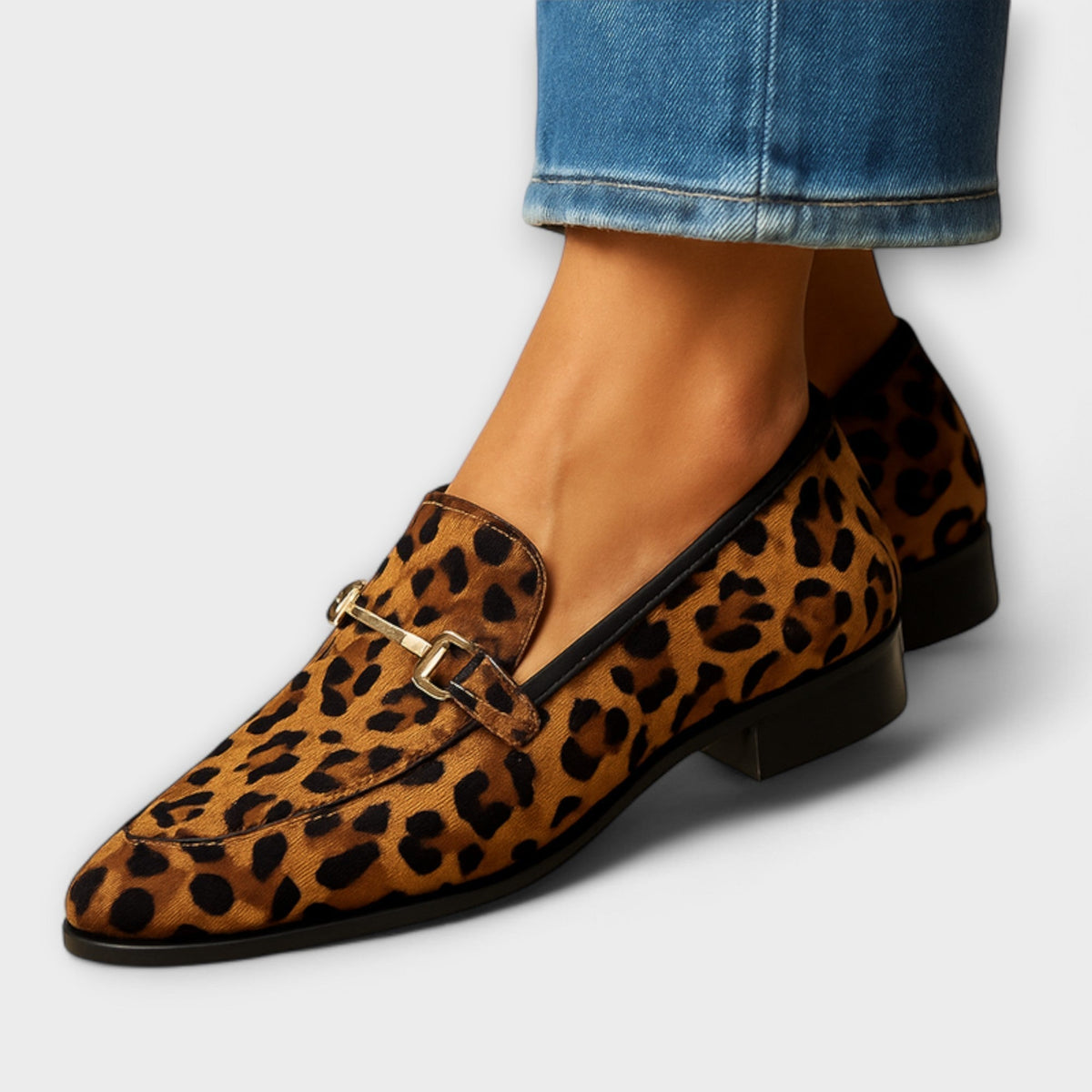 Leopard-print loafer with buckle strap and black block heel