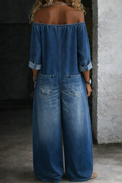 Blue off-shoulder denim jumpsuit, back view, wide legs with patch pockets