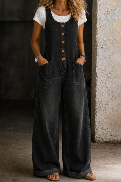 Black denim overalls with chest bib, vertical button placket, and two front pockets