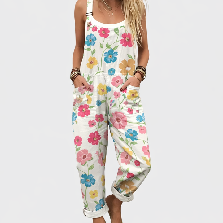 Floral printed sleeveless overalls in white with colorful flowers, wide legs