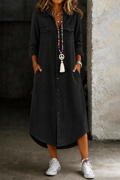 Black denim shirt dress, long button-front with collar and chest pockets.
