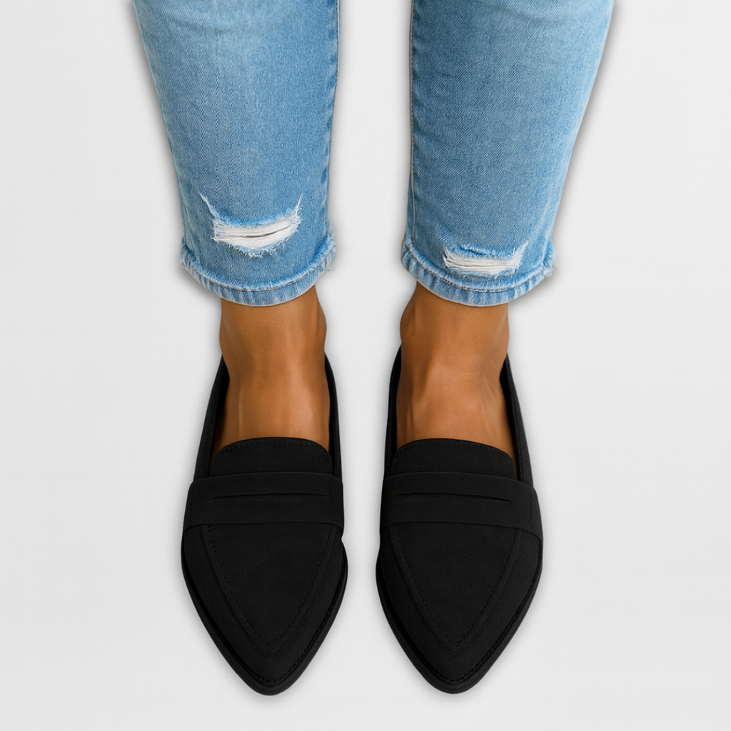 Suede loafers in black with slip-on strap detail and almond-shaped stitched toe