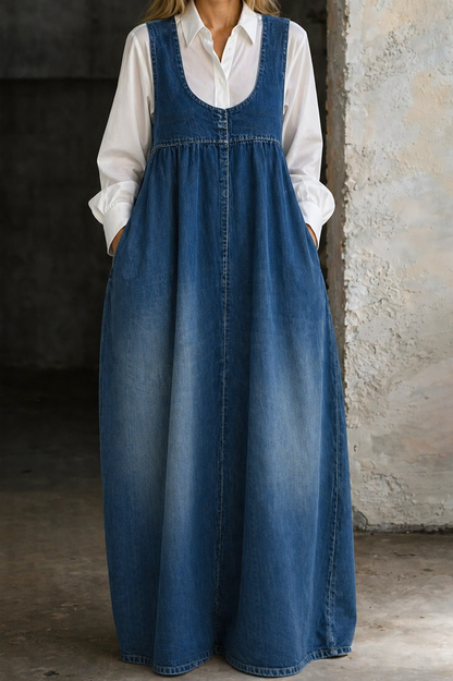 Loose denim vest dress in medium blue with gathered bib and button front
