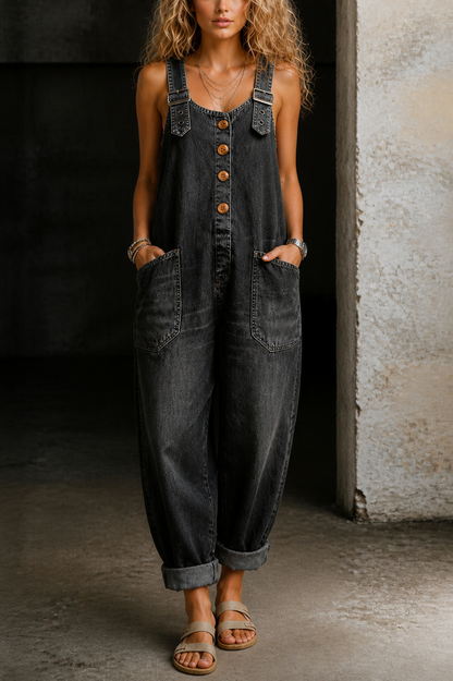 Black denim overall jumpsuit with button front and two side patch pockets