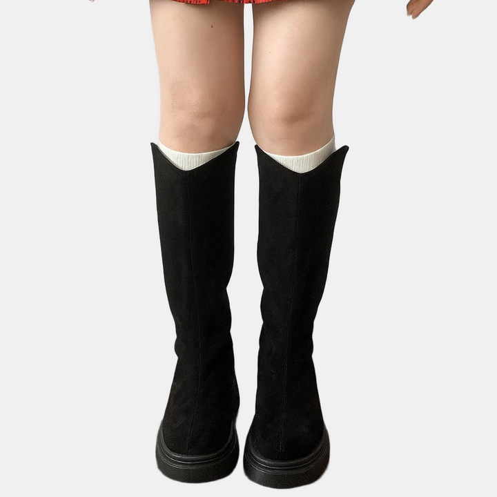 Black high boots with white sock cuffs, suede-look upper, chunky sole, block heel