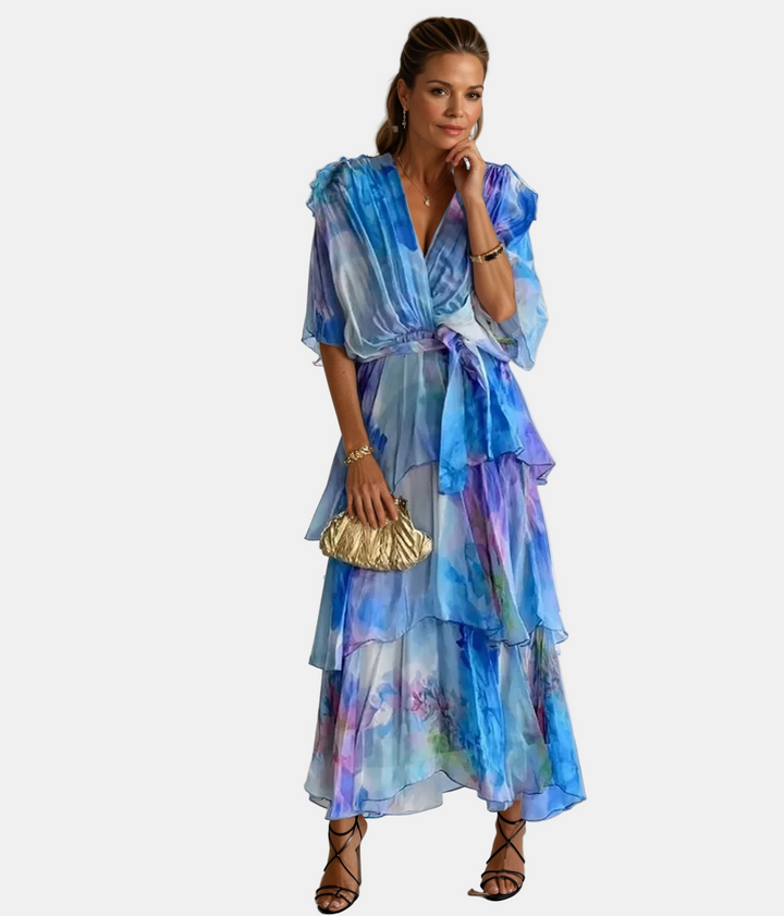 Blue printed V-neck tiered dress with flutter sleeves and ruched waist detail