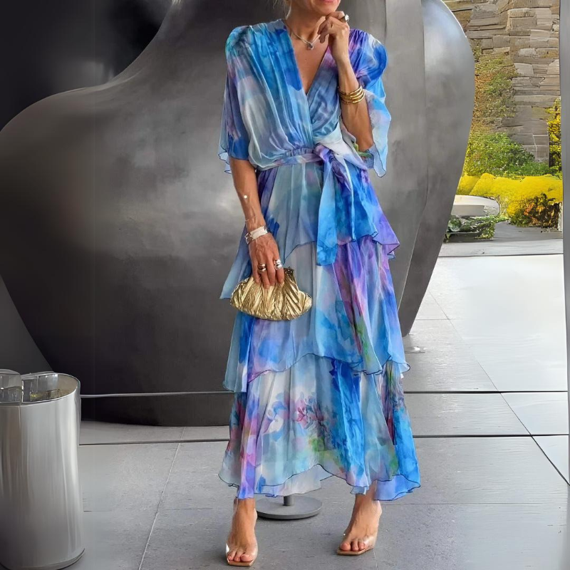 Blue printed V-neck tiered maxi dress with belted waist and layered ruffle skirt