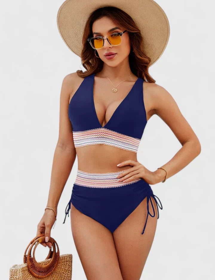 Women’s dark blue bikini set with deep V top, striped waist band, and tie-side bottoms