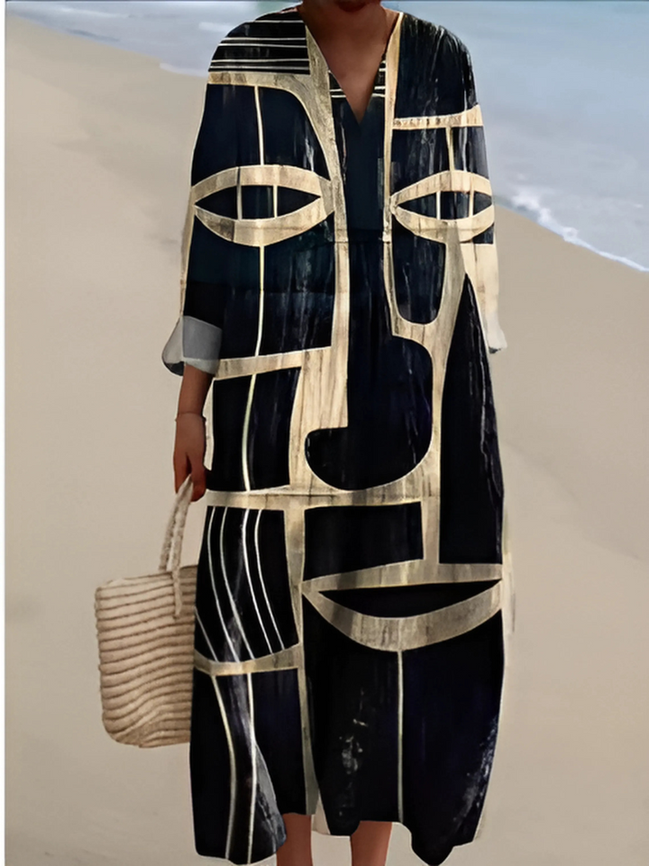 Geometric print dress with V-neck, black and cream face mask pattern, long sleeves