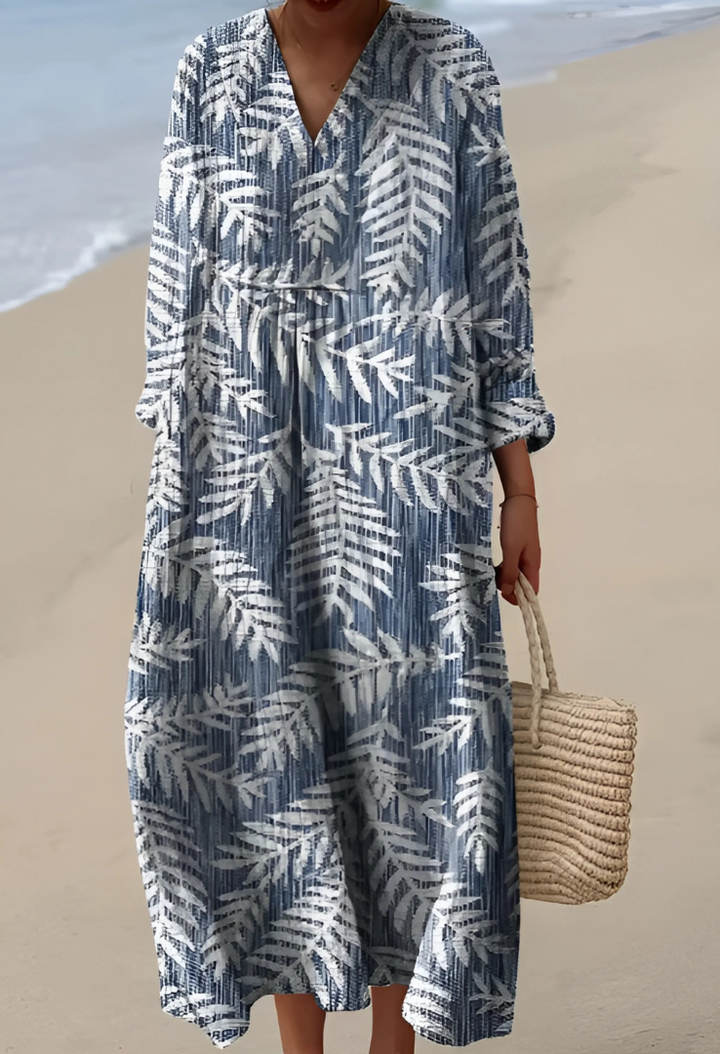 Women’s blue-and-white geometric V-neck midi dress with long sleeves