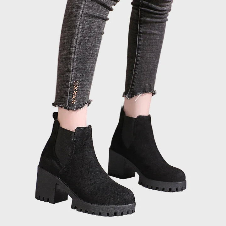 Black block-heel Chelsea boots with chunky tread and side gore elastic