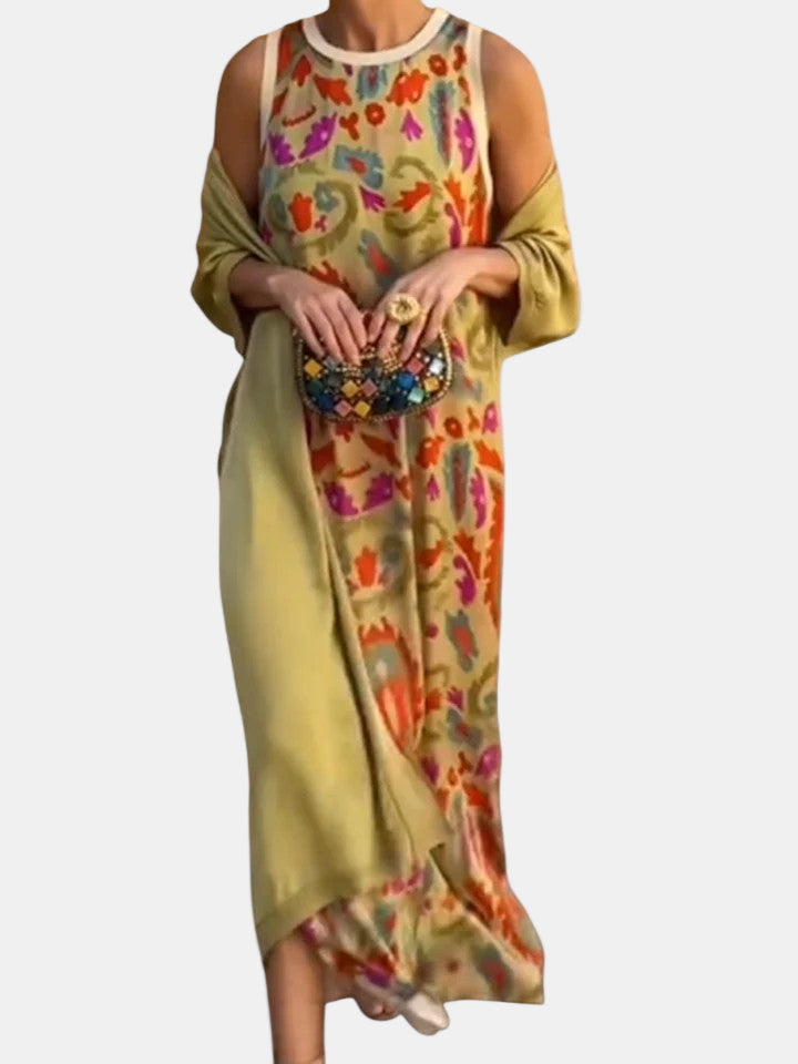 Sleeveless maxi dress in pale green with multicolor floral and paisley print, crew neck
