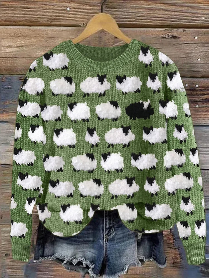 Cozy holiday knit jumper in green with white sheep motifs