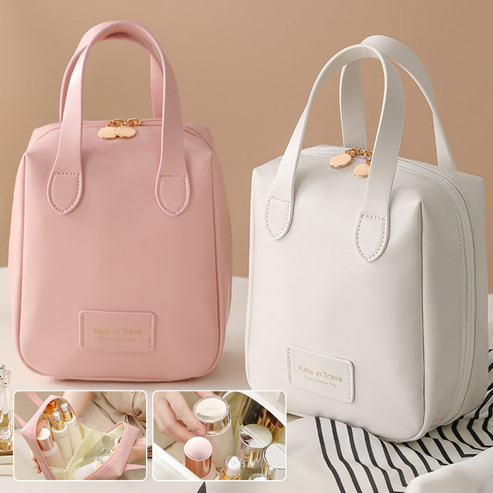 Pink and white travel bags with handles and front logo patch; open organizer shown