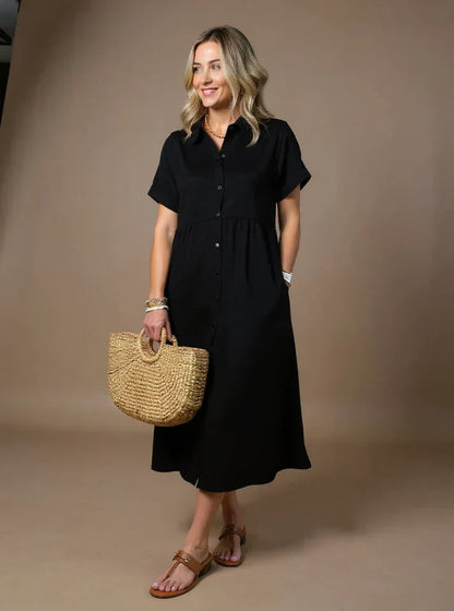 Black button-front striped shirt dress with short sleeves and gathered waist midi length