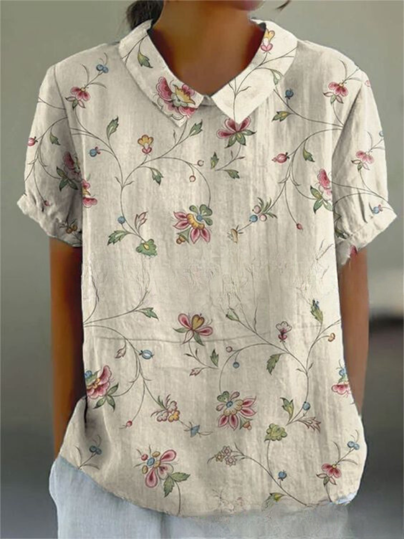 Women’s vintage floral print shirt, off-white with colorful flower vines, V-neck and short sleeves
