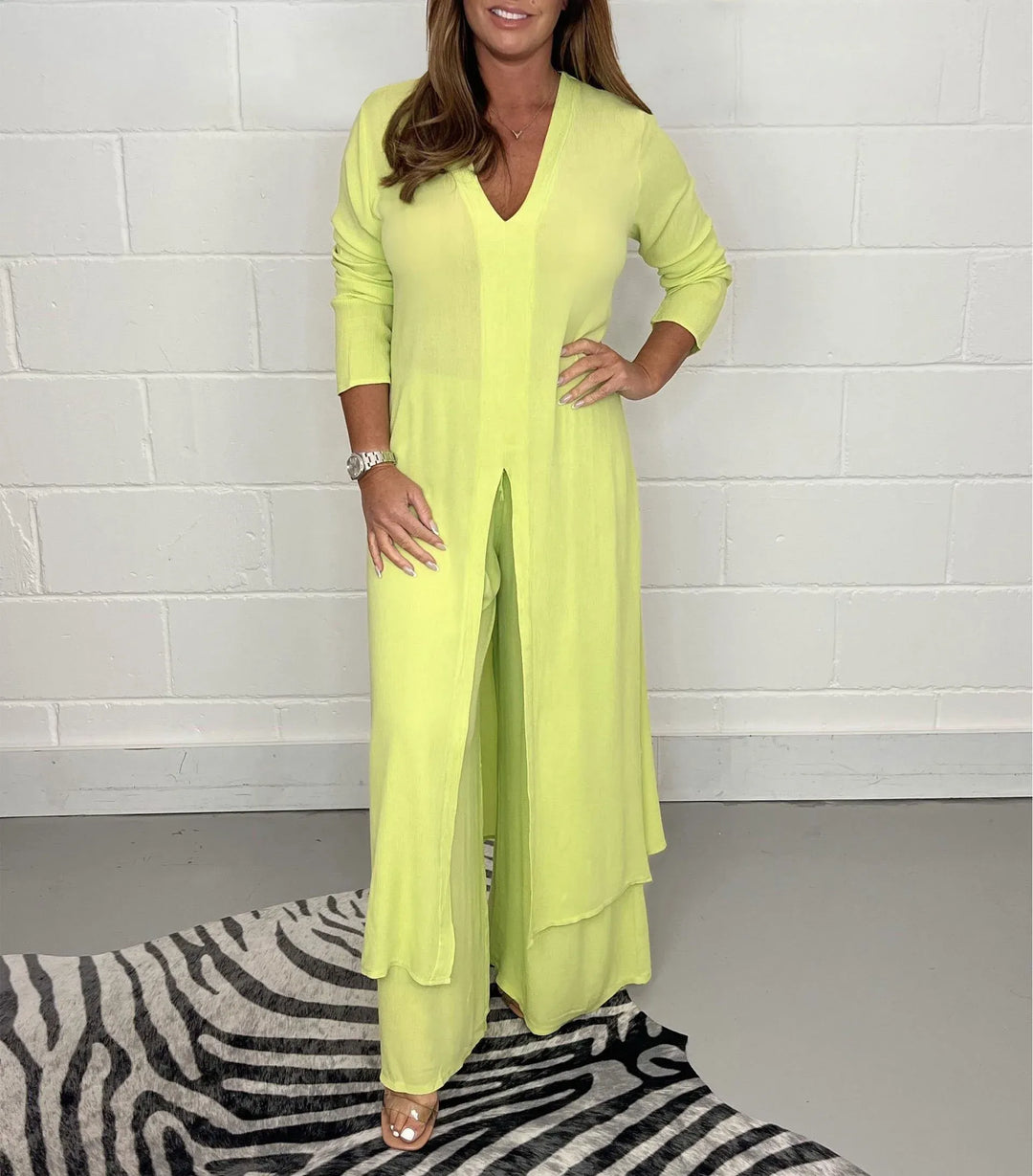 Lime yellow two-piece set with V-neck flowy blouse and wide-leg trousers, side slit