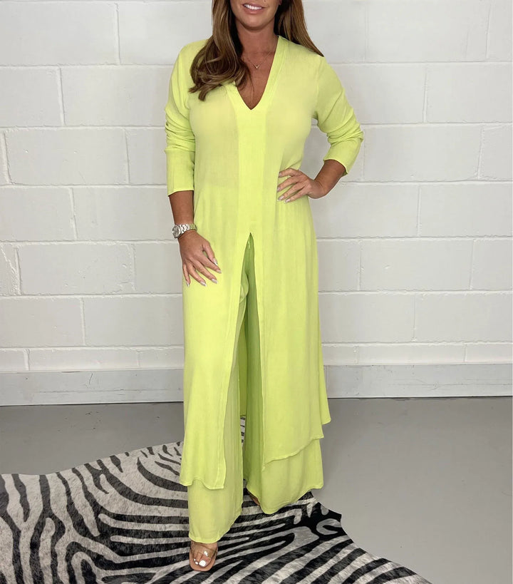 Lime yellow two-piece set with V-neck flowy blouse and wide-leg trousers, side slit