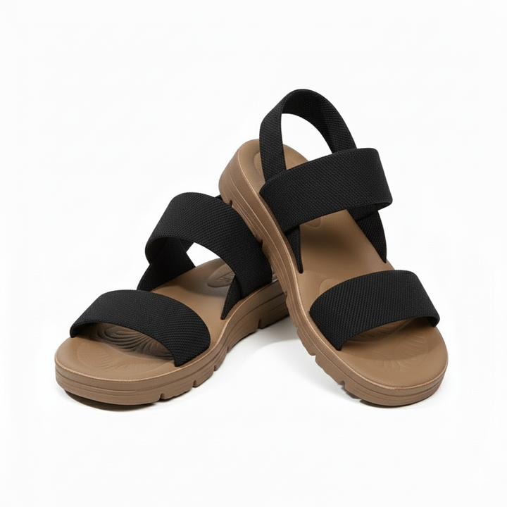 Black orthopedic slide sandals with multiple wide fabric straps and padded footbed
