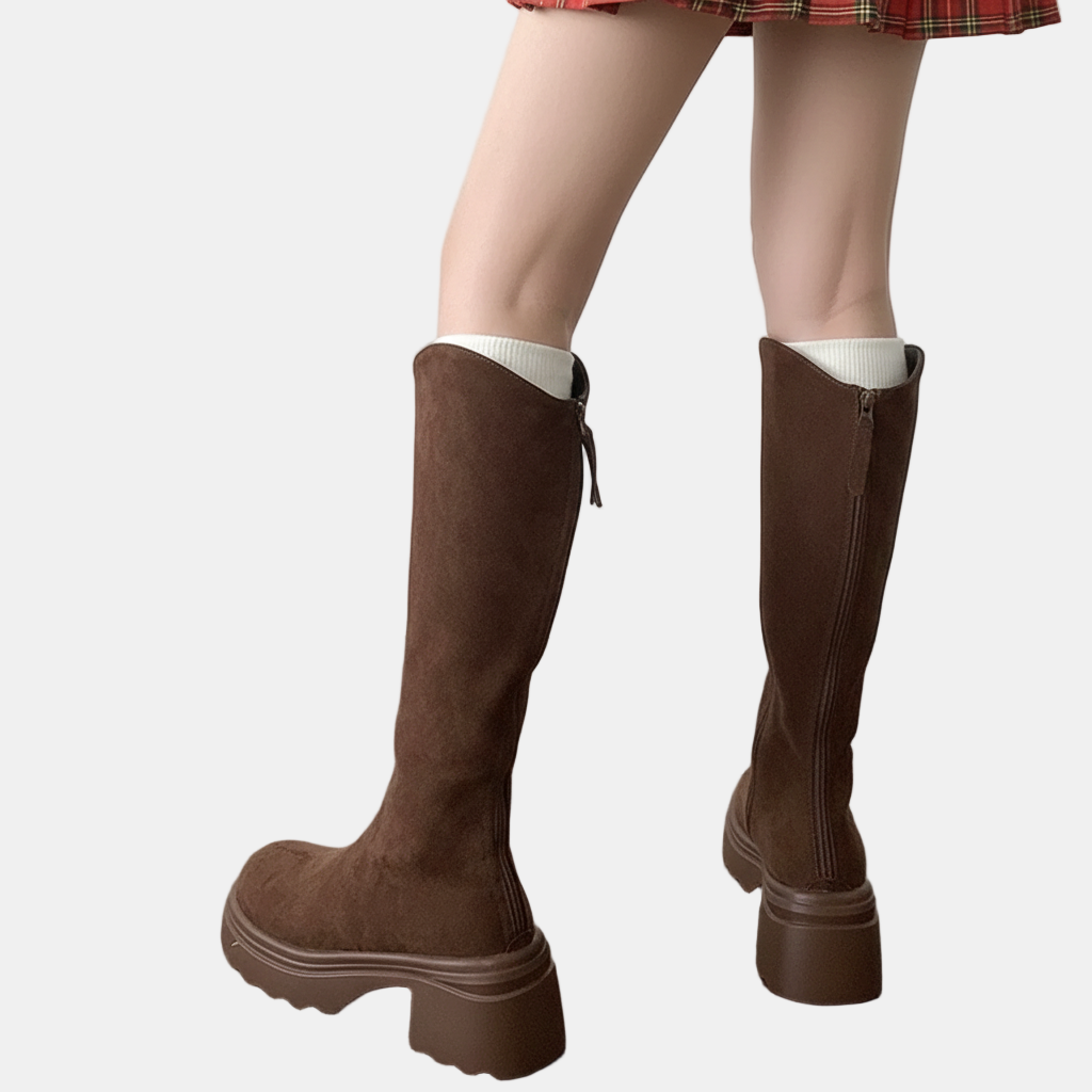 Brown high boots with white sock cuffs, suede-look finish, chunky sole and heel