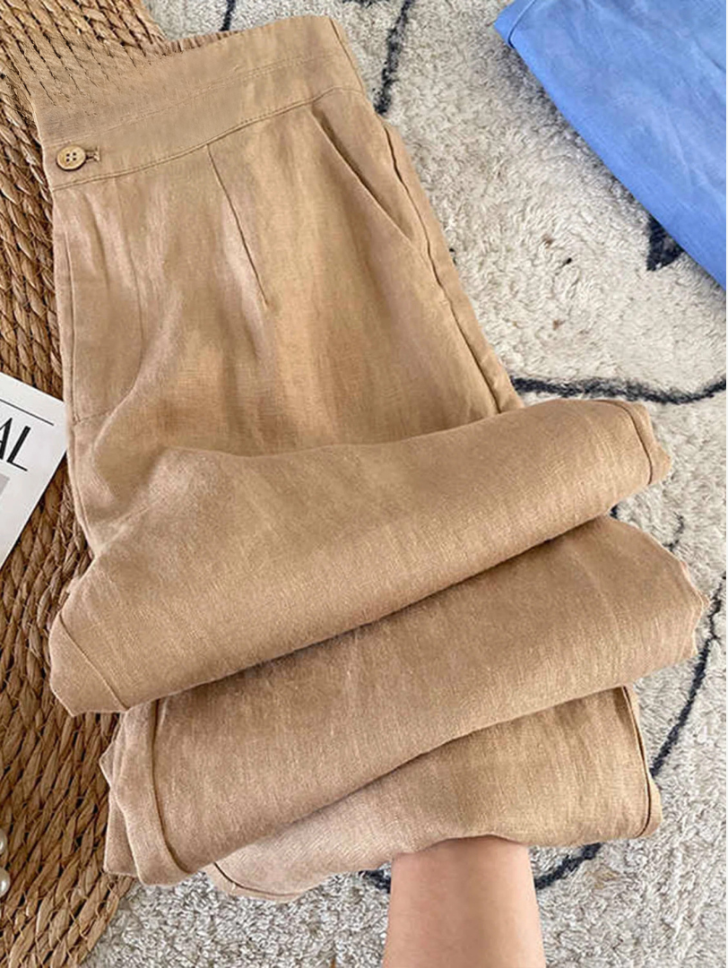 Khaki wide-leg pants with buttoned waistband and front pleats