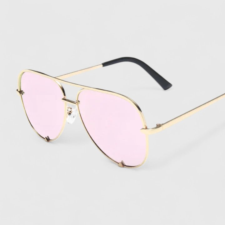 Gold sunglasses with pink gradient lenses and slim aviator-style frames