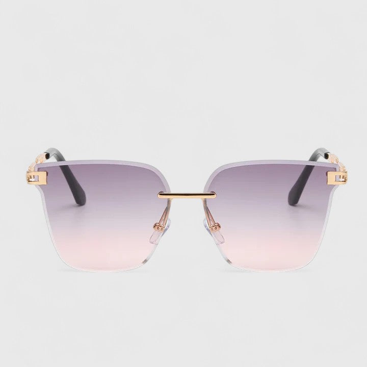 Sophisticated sunglasses with pink gradient lenses and light frame, square cat-eye shape