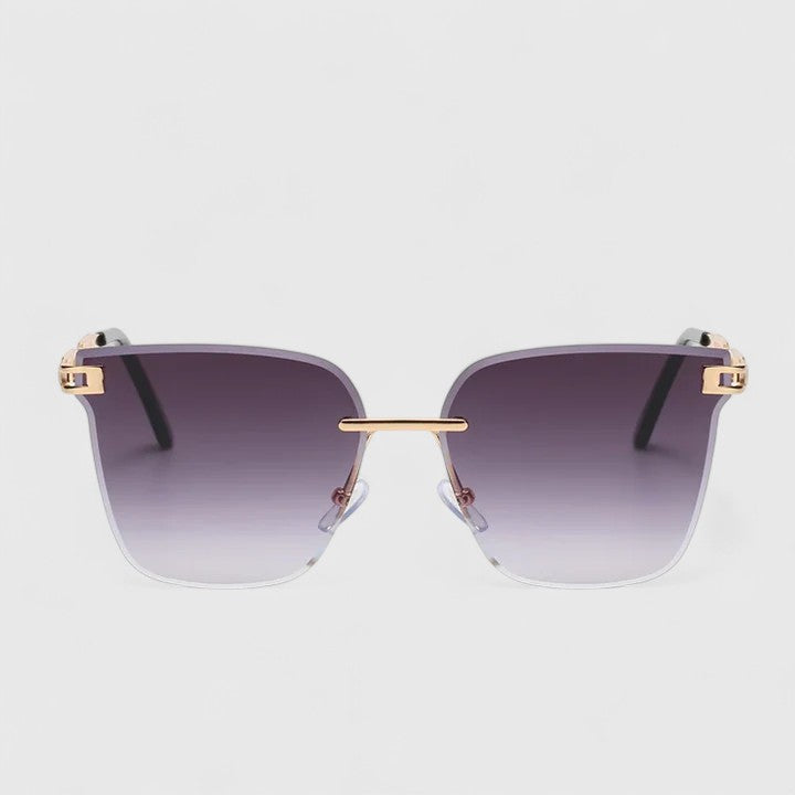Sophisticated sunglasses with purple gradient lenses and gold bridge bar frame