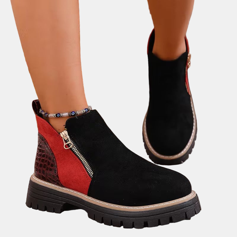 Black and red orthopedic ankle boots with side zipper and chunky tread sole
