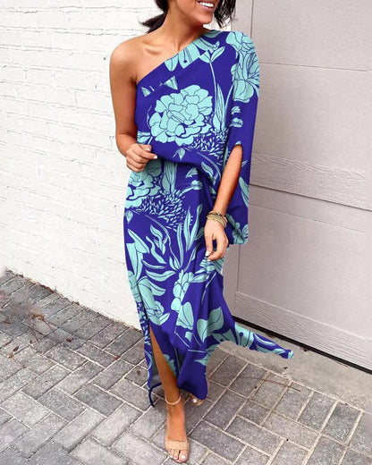One-shoulder floral maxi dress in deep blue with light teal and green botanical print