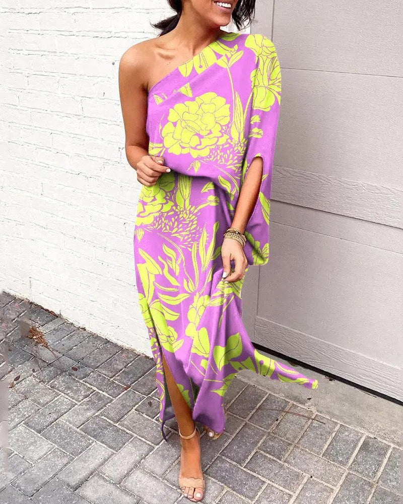 One-shoulder floral maxi dress in purple with neon yellow and green botanical print