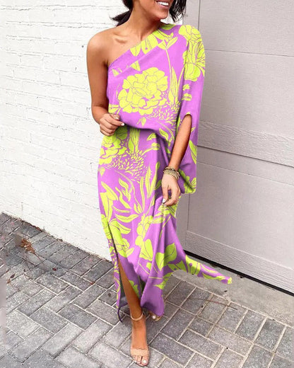One-shoulder floral maxi dress in purple with neon yellow and green botanical print