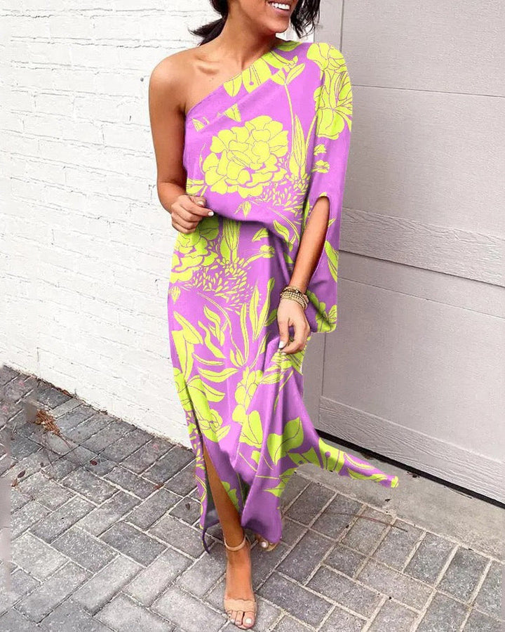 One-shoulder floral maxi dress in purple with neon yellow and green botanical print