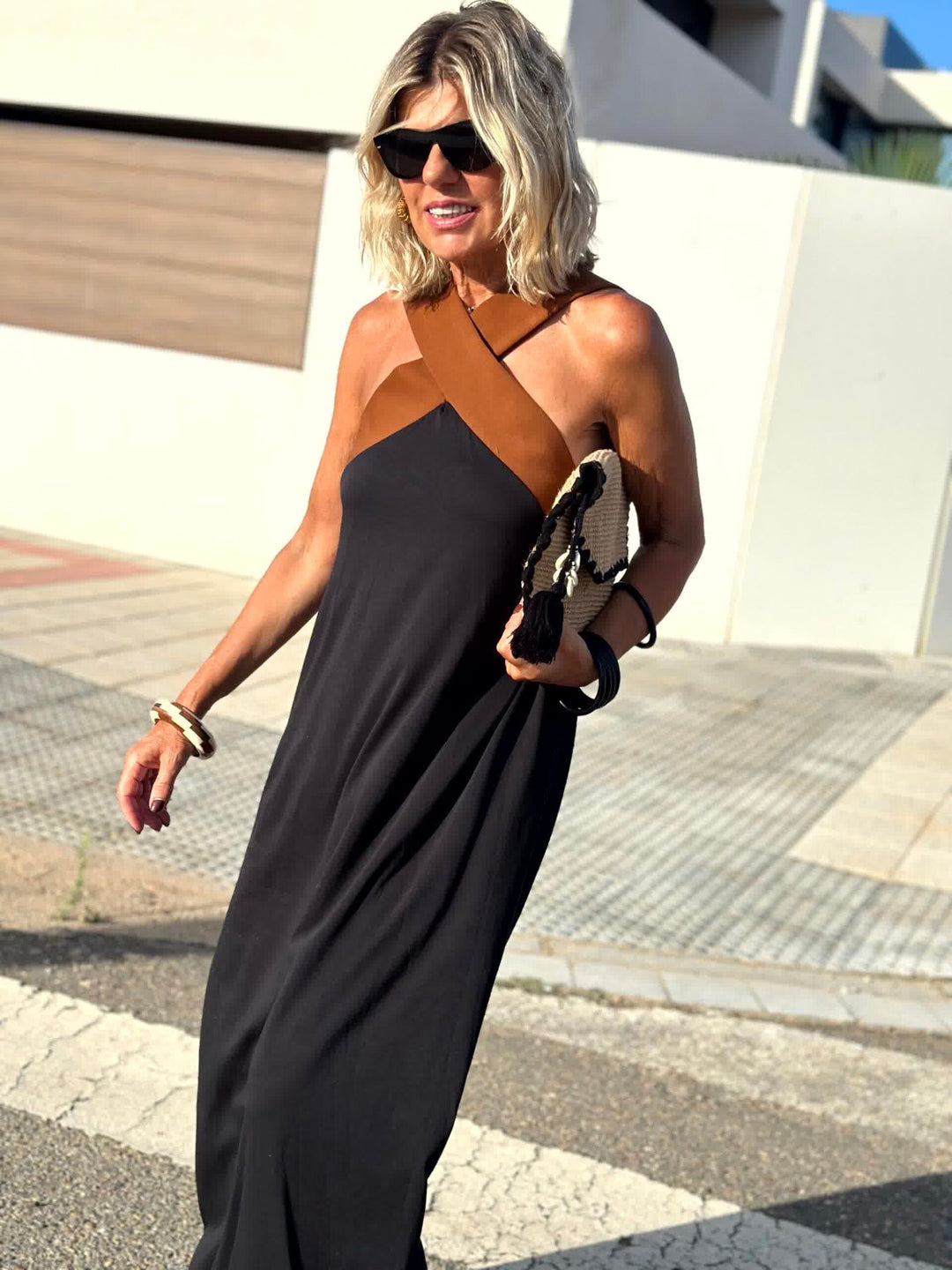 Black crossed halter maxi dress, sleeveless with crisscross strap neckline