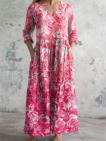 Pink floral V-neck maxi dress with gathered waist and three-quarter sleeves
