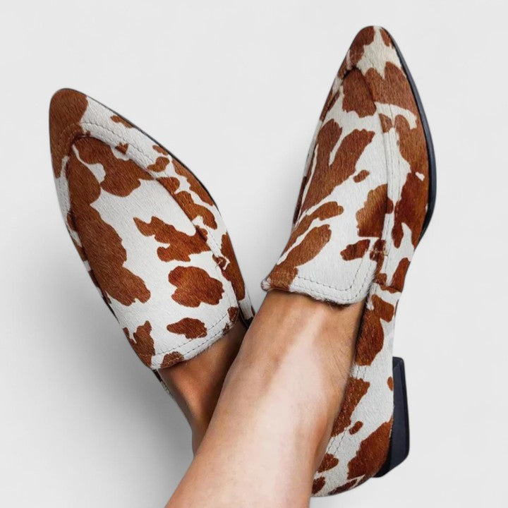Brown and white leopard print loafers, slip-on comfort style with low heel