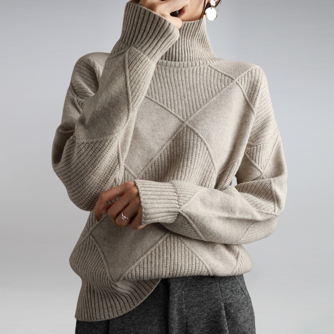 Taupe ribbed turtleneck pullover with crisscross cable pattern on back
