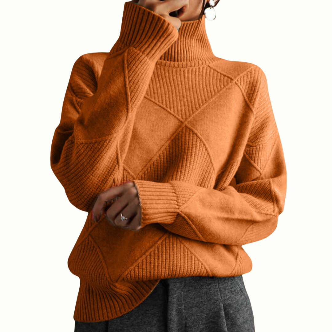 Orange ribbed turtleneck pullover, high neck and crisscross cable motif