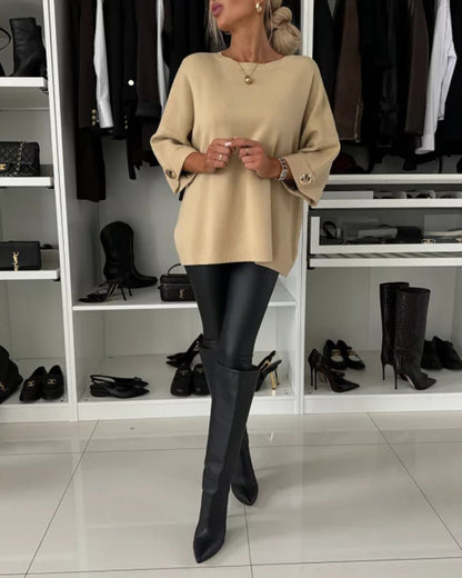 Beige cosy buttoned pullover sweater with round neckline and buttoned sleeve cuffs