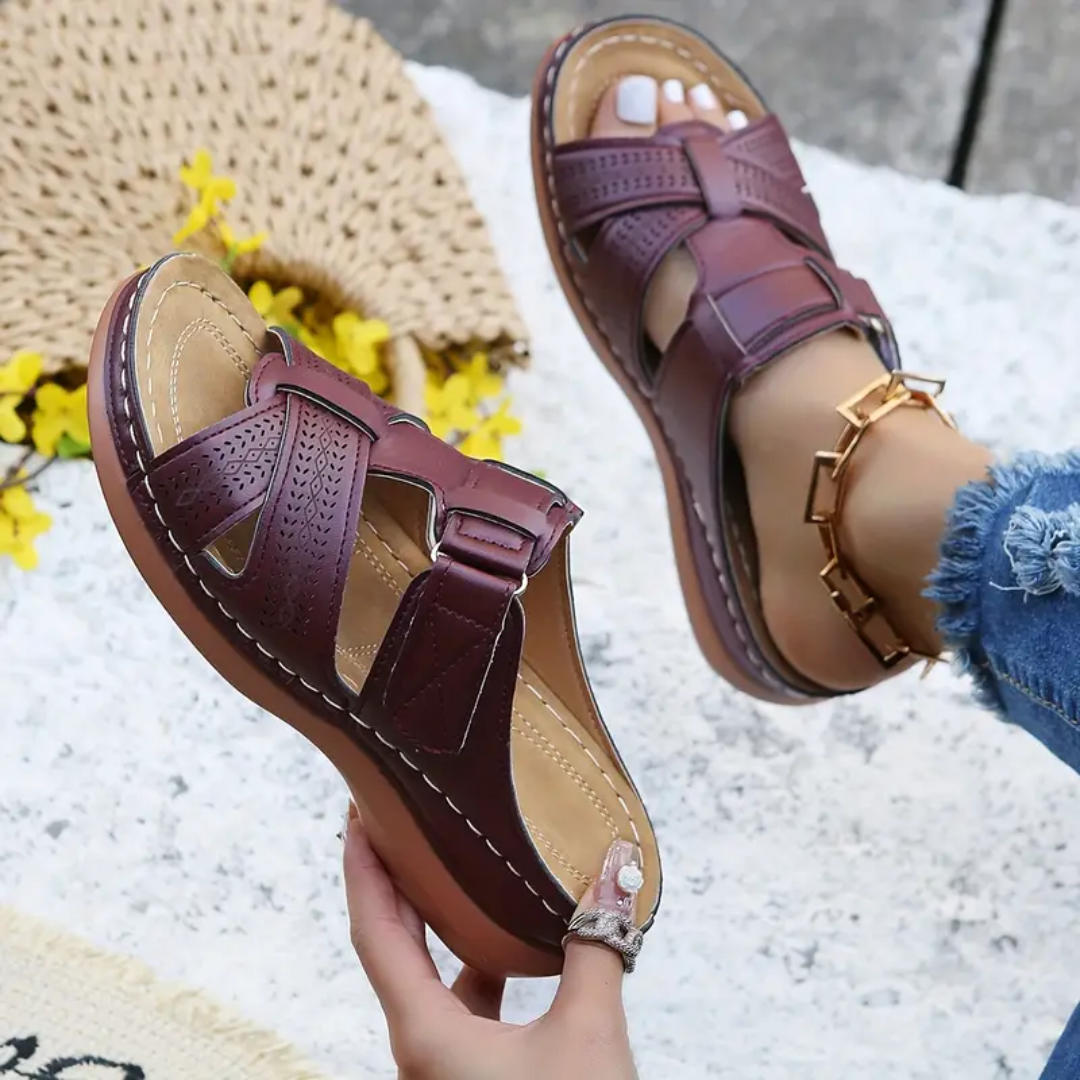 Plum ergonomic sandals with front buckle straps and perforated toe panel