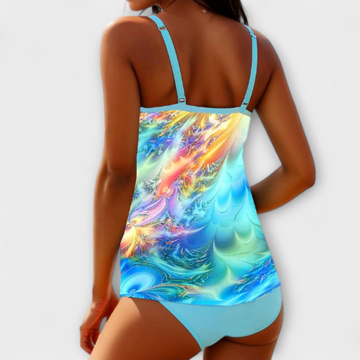 Tankini set back view with blue multicolor print tankini top and light blue briefs