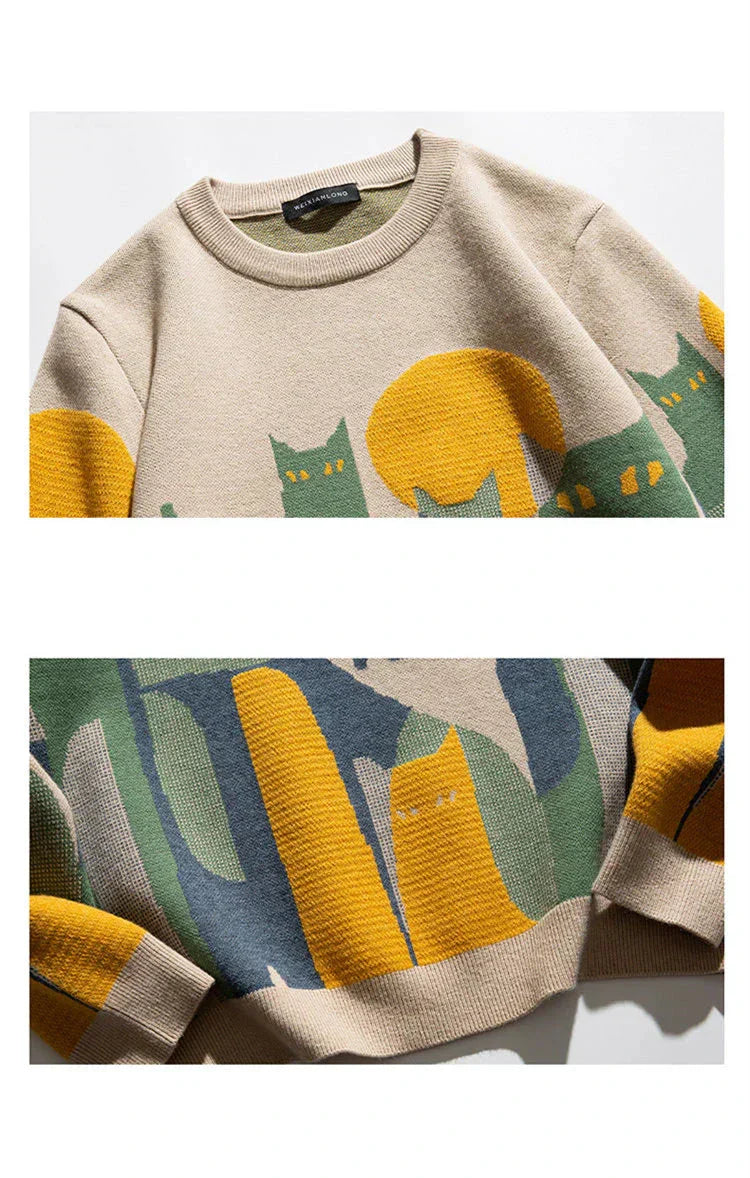 Unisex cat sweater detail, beige crewneck with yellow cat and ribbed cuffs
