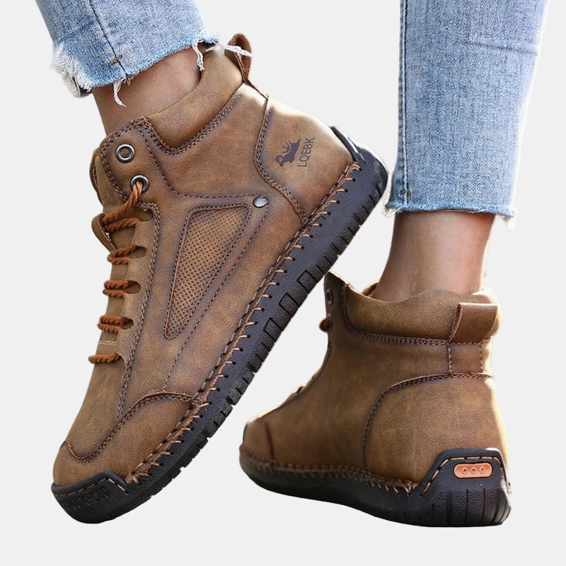 Brown lace-up lightweight comfort sneakers with textured side panel and rubber sole