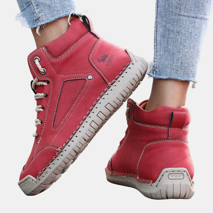 Red lace-up lightweight comfort sneakers with padded back and rubber sole