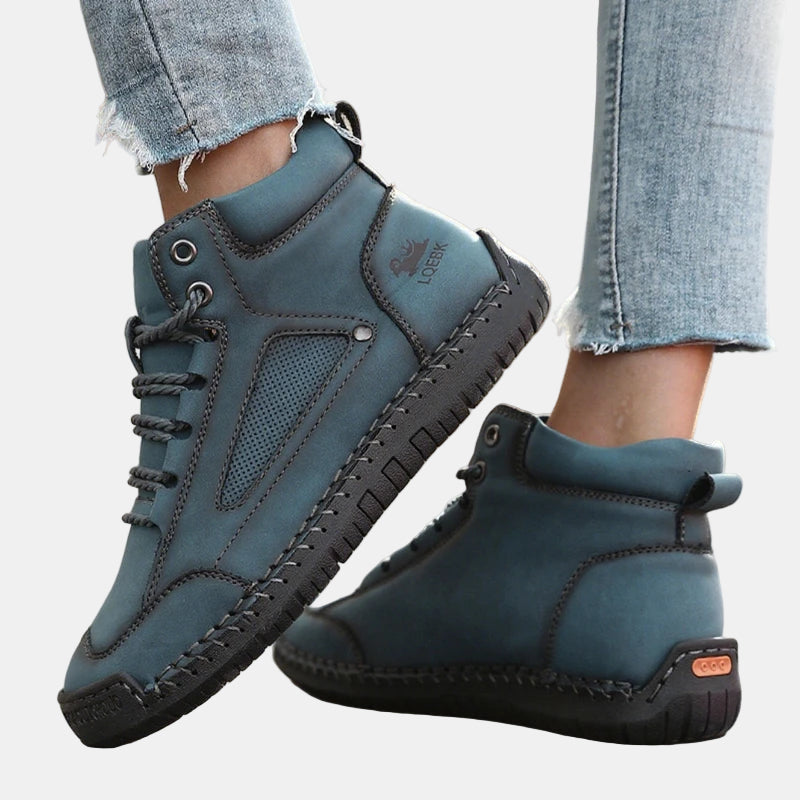 Teal lace-up lightweight comfort sneakers with perforated panel and rubber tread sole