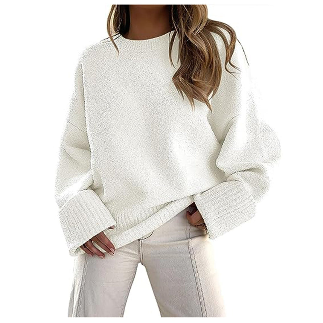 White fuzzy knit pullover sweater with crew neck and ribbed cuffs, oversized fit