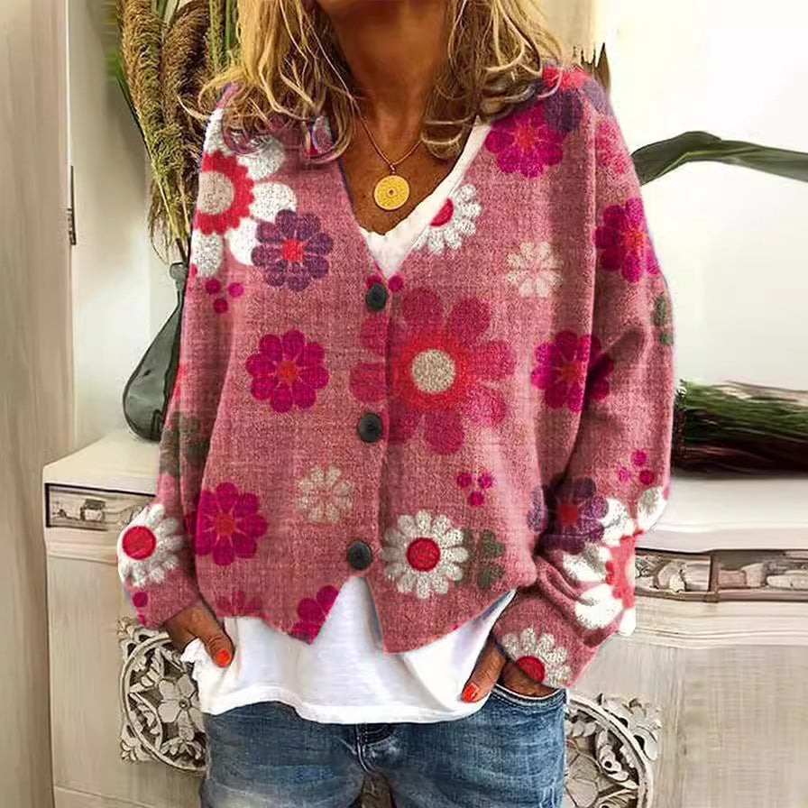 Boho cardigan with pink floral print and dark button front, long sleeves