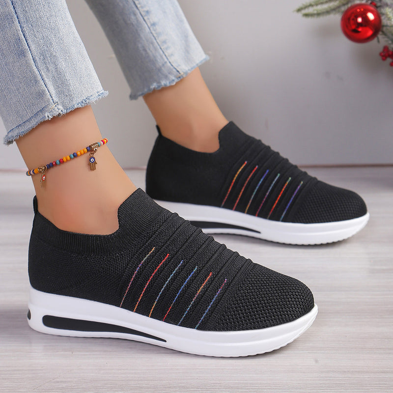 Black knit slip-on sneakers with multicolor stripe detail and white sole