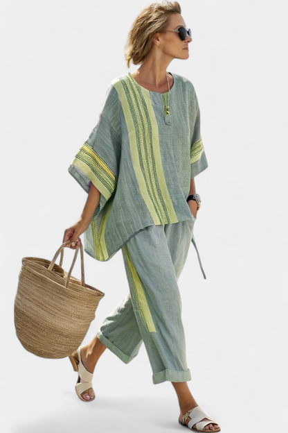 Green tunic top with lime striped trim and matching cropped trousers