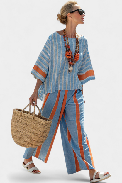 Blue striped top with orange trim and matching linen trousers